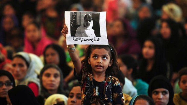 Solidarity ... Pakistani women and girls rally in Karachi in support of Malala Yousafzai.