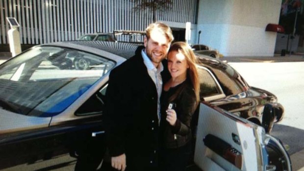 On her mum's side ... Ginia Rinehart with her boyfriend in front of her $1.2 million car.