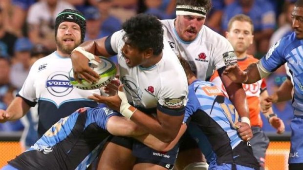 'Home' game: Will Skelton offloads in the Waratahs' loss to the Force.