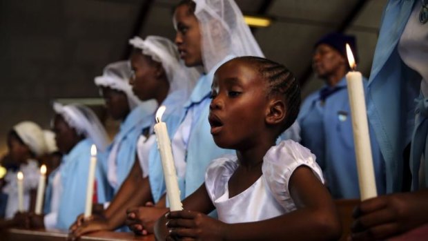 National day of prayer: Remembering Nelson Mandela at Regina Mundi Church in Soweto.