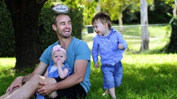 Former Raiders and Manly winger Michael Robertson has retired due to injury. He is back in Canberra, with children Kobe, 2, and Emily 1.