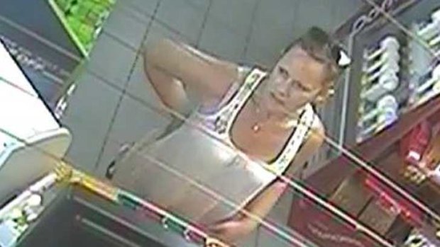 A security camera picture of the woman suspected of using stolen credit cards.