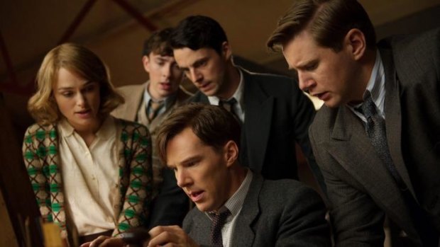 Benedict Cumberbatch, sitting centre, as Alan Turing in the film <i>The Imitation Game</i>.
