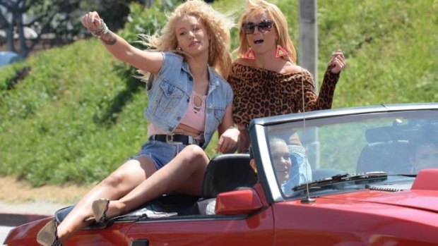 Iggy Azalea and Britney Spears on the set of their music video in Los Angeles in April.