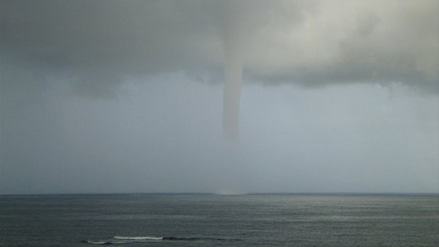 "As high as the Empire State Building": the spectacular water spout captured by Ray Maker.