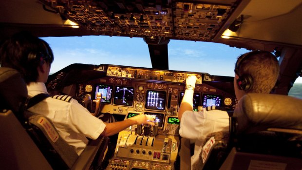 At the wheel: Pilots in a British Airways 747 simulator.