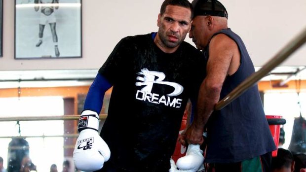 Anthony Mundine says he still needs to lose about 1.5kg before the weigh-in.