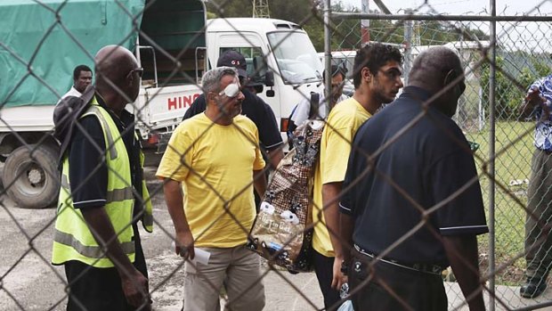 Injured asylum seekers on Manus Island.