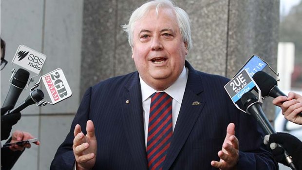 Clive Palmer wants extra staff from Prime Minister Tony Abbott.
