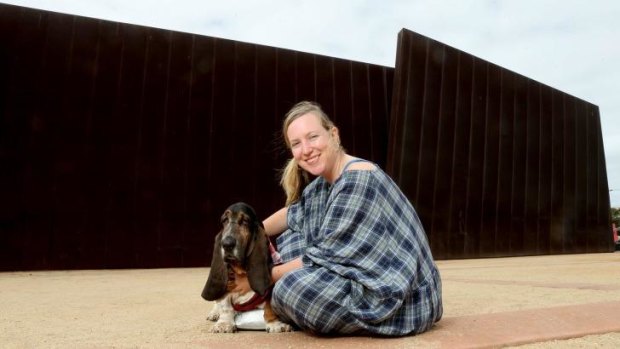 Artist Anastasia Klose  with her dog Farnsworth who has his own Instagram account.