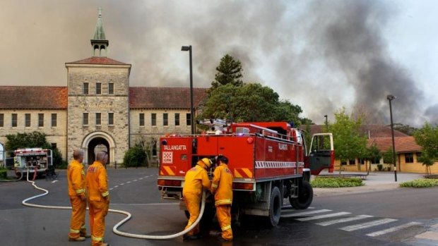 Firefighters near St Columba's in October 2013.