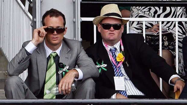 Eyes on prize: Jake Stephens (left) watches the 2009 Melbourne Cup, in which Alcopop started favourite.