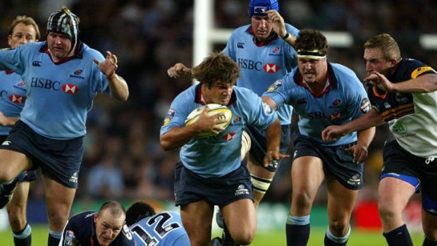 Days gone by ... Adam Freier in action for the Tahs against the Brumbies in 2004.
