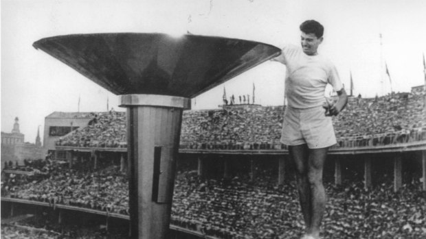 Ron Clarke lighting the Olympic flame, Melbourne 1956. 