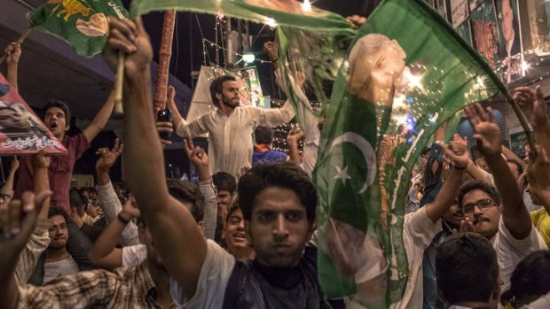 Big turnout: Supporters of Nawaz Sharif celebrate on the streets of Lahore after his election win.