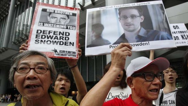 Political asylum: Supporters of Edward Snowden march to the US Consulate in Hong Kong.