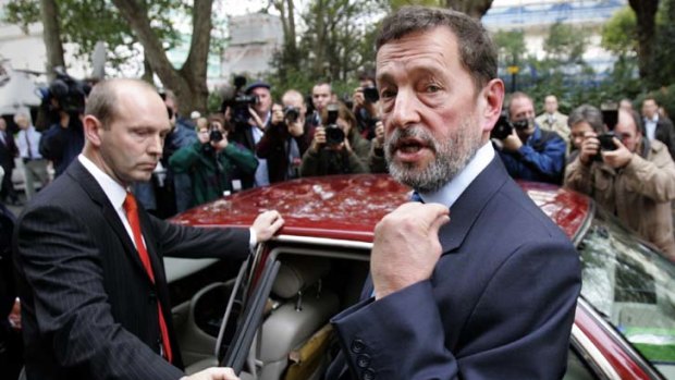 Former British home secretary David Blunkett leaves after announcing his resignation in London on November 2, 2005.