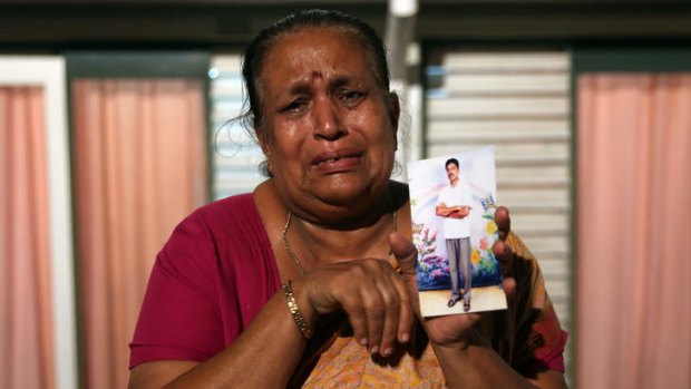 Protesting for human rights in Colombo ... Tangaraja Rajeshwari, a woman belonging to the Sri Lankan minority Tamil ethnic group, holds up a photo of her son who disappeared during the final stage of the Sri Lankan Civil War.