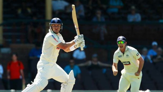 Caught Andrew McDonald, bowled John Hastings ... NSW's Shane Watson instantly rues this shot during the second day of the Sheffield Shield match against Victoria yesterday.