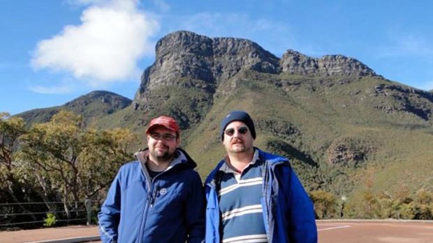 Alfred Rosche (right) poses with friend Matt Bell in front of Bluff Knoll on Wednesday. The next day he died after flying his glider into the side of the mountain.