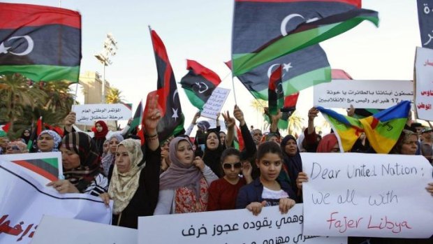 Supporters of Libya Dawn, a group of Islamist-leaning forces mainly from Misrata, demonstrate against the Libyan parliament at Martyrs' Square in Tripoli.