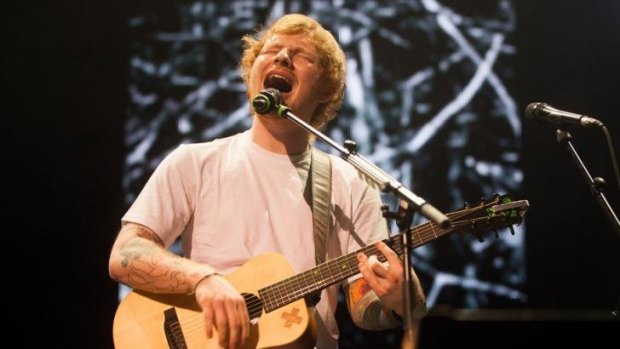 Guitar man: Ed Sheeran will be the first musician to perform an Australian and New Zealand stadium tour entirely solo, promoters say. 