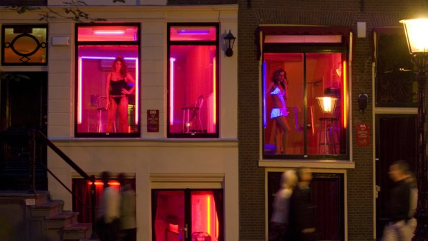 The red-light district windows of sex workers have become a tourist attraction.