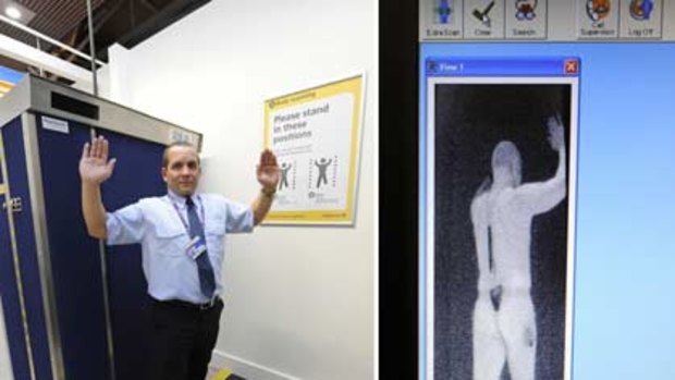 Concerns...a security guard demonstrates a body scanner.