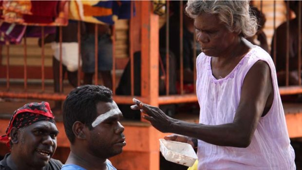 Pride of Yolngu ... everything needs to be discussed with the community before Gurrumul, centre, travels.