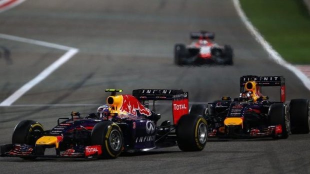 Under pressure: Ricciardo leads his teammate Sebastian Vettel on the track.
