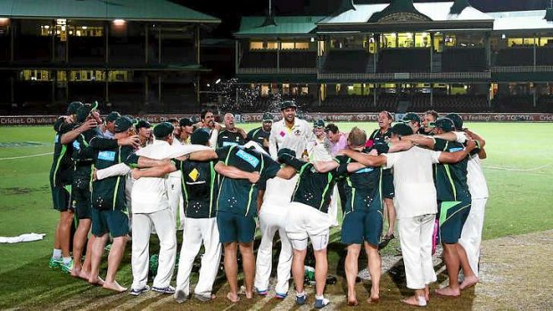 Under the Southern Cross: Nathan Lyon leads the team song on the SCG pitch at midnight after the fifth Ashes Test.