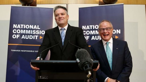 Side-splitting: Finance Minister Mathias Cormann shares a laugh with commission of audit chairman Tony Shepherd.