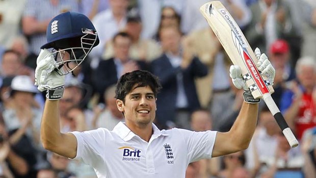 Alastair Cook acknowledges the applause after reaching his century.