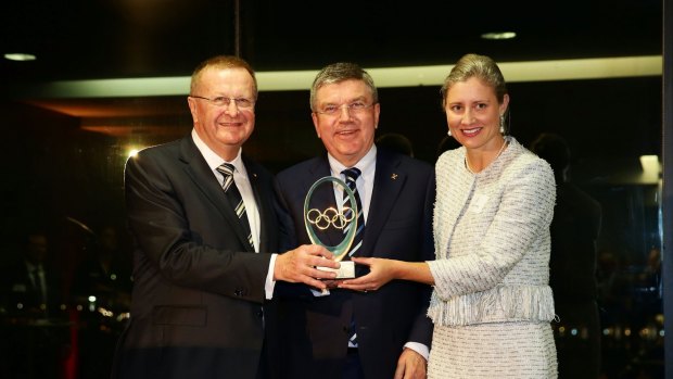 AOC president Coates (left) and then CEO Fiona de Jong, with IOC president Thomas Bach in Sydney. in 2015 – before Coates and de Jong fell out.