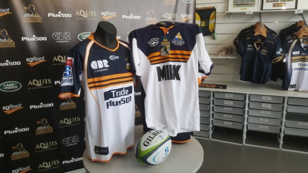 The ACT Brumbies jersey for the 2018 Super Rugby season, left, next to a heritage jersey from 1996.