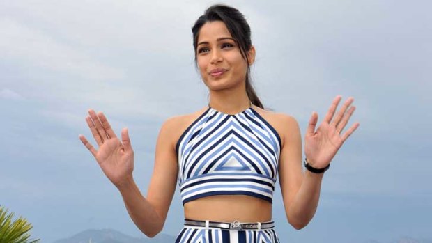 Freida Pinto shows the world how to combine Cote d'Azur elegance with a bare midriff at Cannes Film Festival. The look, dare we say it, is back.