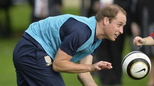 Britain's Prince William trains in the grounds of Buckingham Palace.