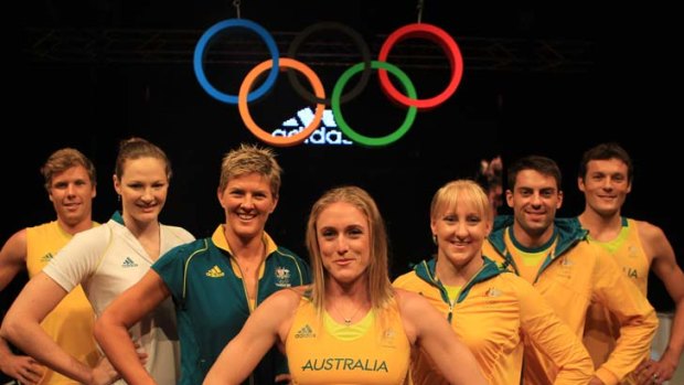 Suit yourself ... Australian athletes including Sally Pearson, centre, and Natalie Cook, on her right, try the new competition gear.
