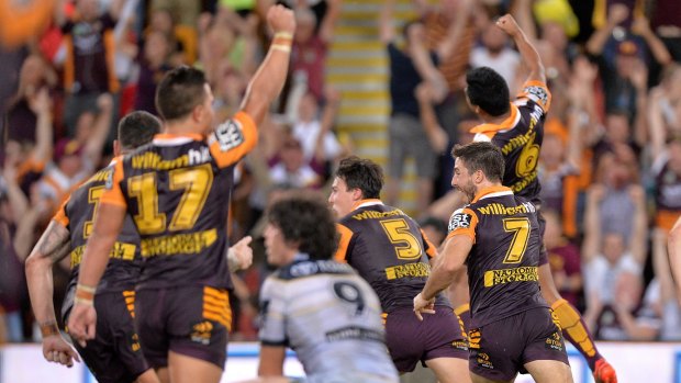The moment: The Broncos celebrate Anthony Milford's winning field goal. 