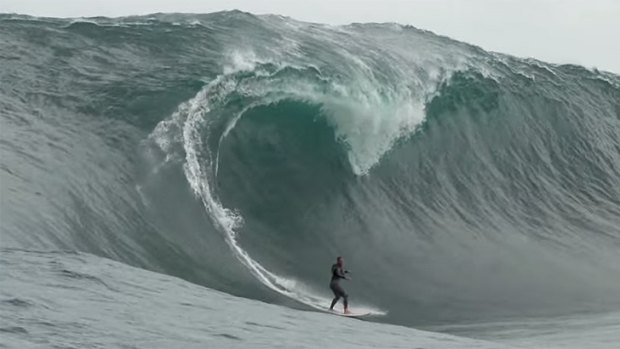 Former West Coast Eagle Phil Read is dwarfed by this monster wave at The Right.