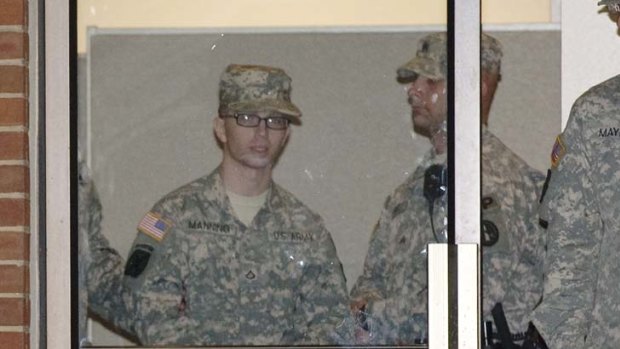 Judgement ... Bradley Manning is escorted into the court.