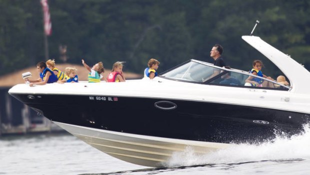 Making waves &#8230; presidential hopeful Mitt Romney takes his family for a boat ride in New Hampshire on Saturday.