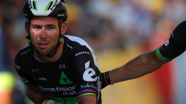 Britain's Mark Cavendish crosses the finish line after he crashed.