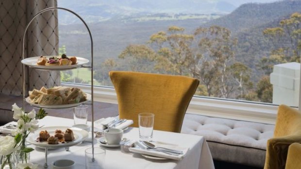 A tasty view: High tea is served with stunning scenery in the background.