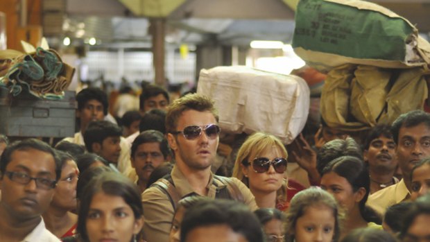 Ben (Joel Edgerton, left) and Fiona (Radha Mitchell) in Kolkata in the scene from Claire McCarthy's "The Waiting City."