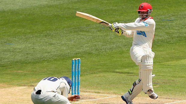 Duck: Phillip Hughes in full flight in an innings that opens up Test considerations.