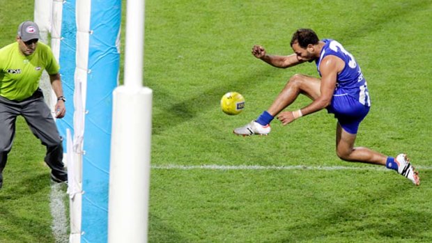 Matt Campbell kicks a goal for North Melbourne earlier this year.