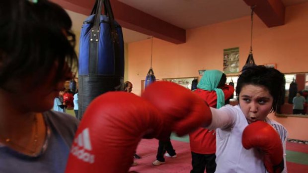 Knockout dreams ... women boxers train twice a week at the Ghazi Stadium, where the Taliban once held executions.