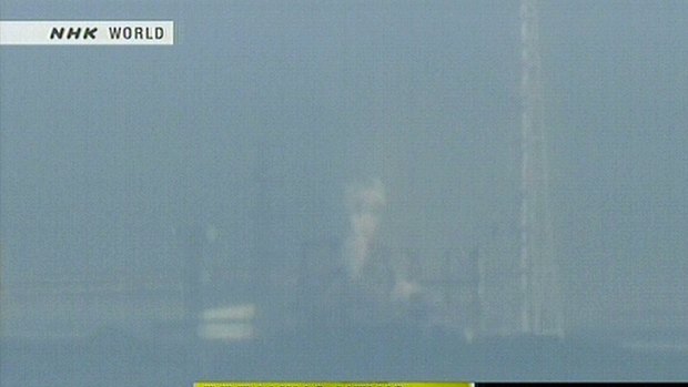 News footage by Japanese public broadcaster NHK shows white smoke rising from the Fukushima No. 1 nuclear power station number three reactor after what reports described as a hydrogen explosion.