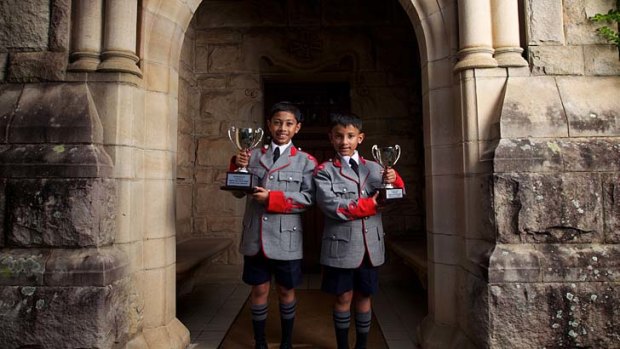 It's their move &#8230; brothers Rowan Willathgamuwa, 10, left, and Kevin, 8 are Slovenia-bound to compete in the World Youth Chess Championship.